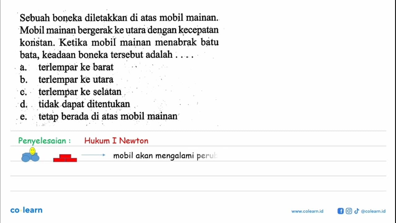 Sebuah boneka diletakkan di atas mobil mainan. Mobil mainan